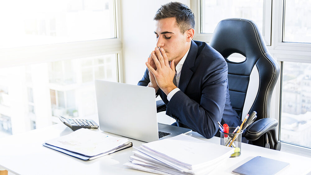 Frustrated man who didn't use an it managed service provider